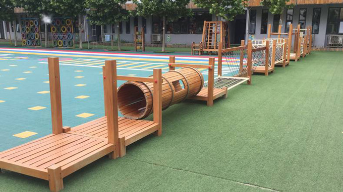 山东厚朴幼儿园儿童实木钻桶组合感统训练户外